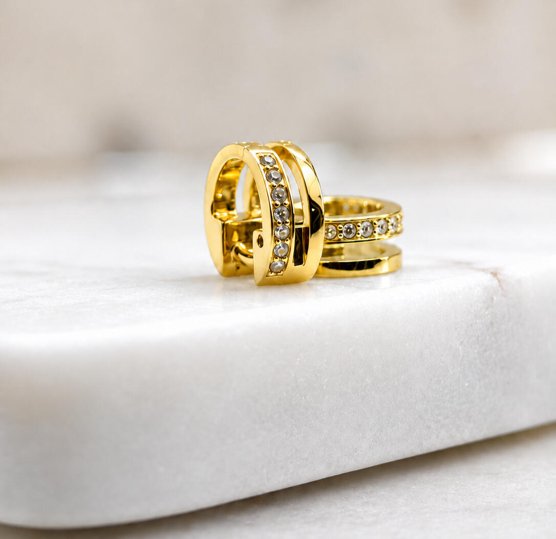 a gold hair cuff on white background